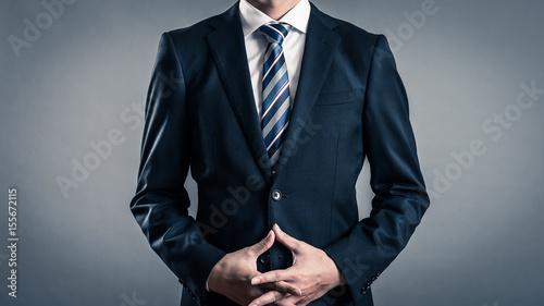 Valokuva ビジネスマン,灰色の背景