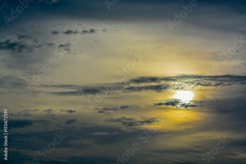 The abstract formation and texture of the clouds over and around the sun. Above the Gulf of Mexico in florida