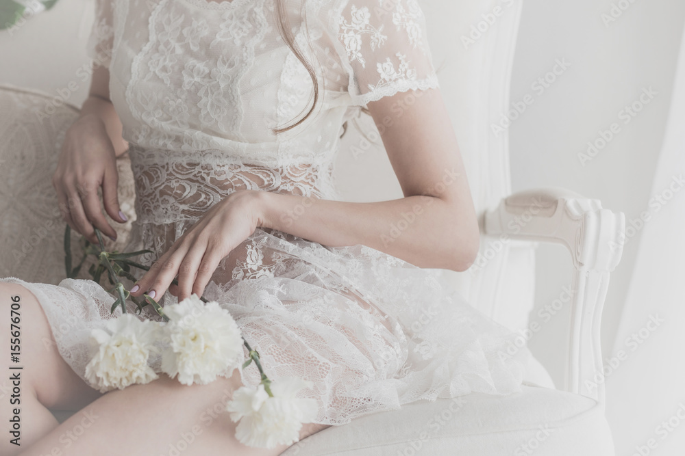 Flowers lie on the lap of a girl Flowers lie on the lap of a girl