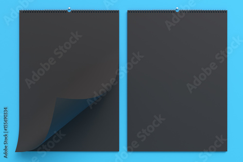 Black wall calendar mock-up on blue background