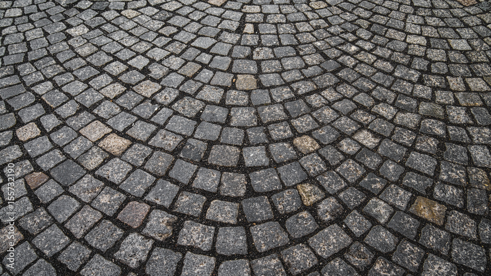 Abstract background of rectangular paving stones in a semicircle. The horizontal frame. Abstract background of rectangular paving stones in a semicircle. The horizontal frame.