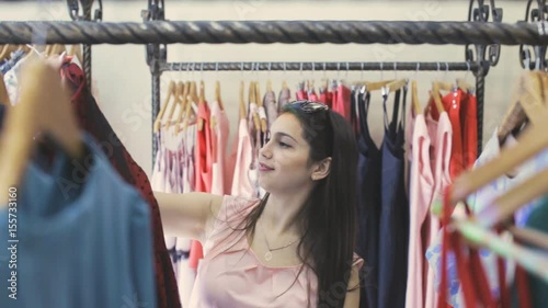 Beautiful girl in a clothing store