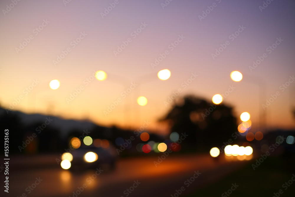 night light of traffic car in the urban street with beautiful twilight sunset sky, abstract blur bokeh background night light of traffic car in the urban street with beautiful twilight sunset sky, abstract blur bokeh background