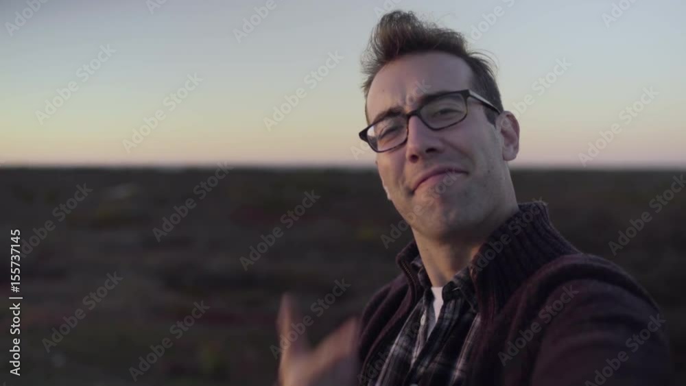 Man Takes Funny Selfies, Switches Angles, Sunset Over Moors In Background Man Takes Funny Selfies, Switches Angles, Sunset Over Moors In Background