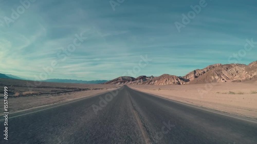 Driving Down Center Of Desert Road, Then Car Transitions To Right Lane