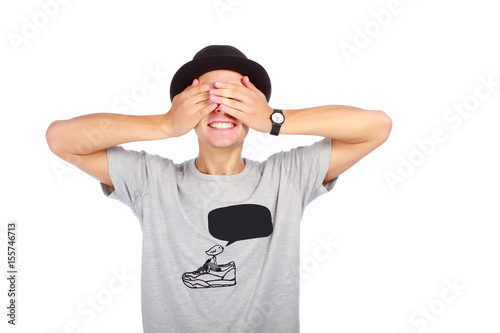 Guy in a hat with closed eyes photo