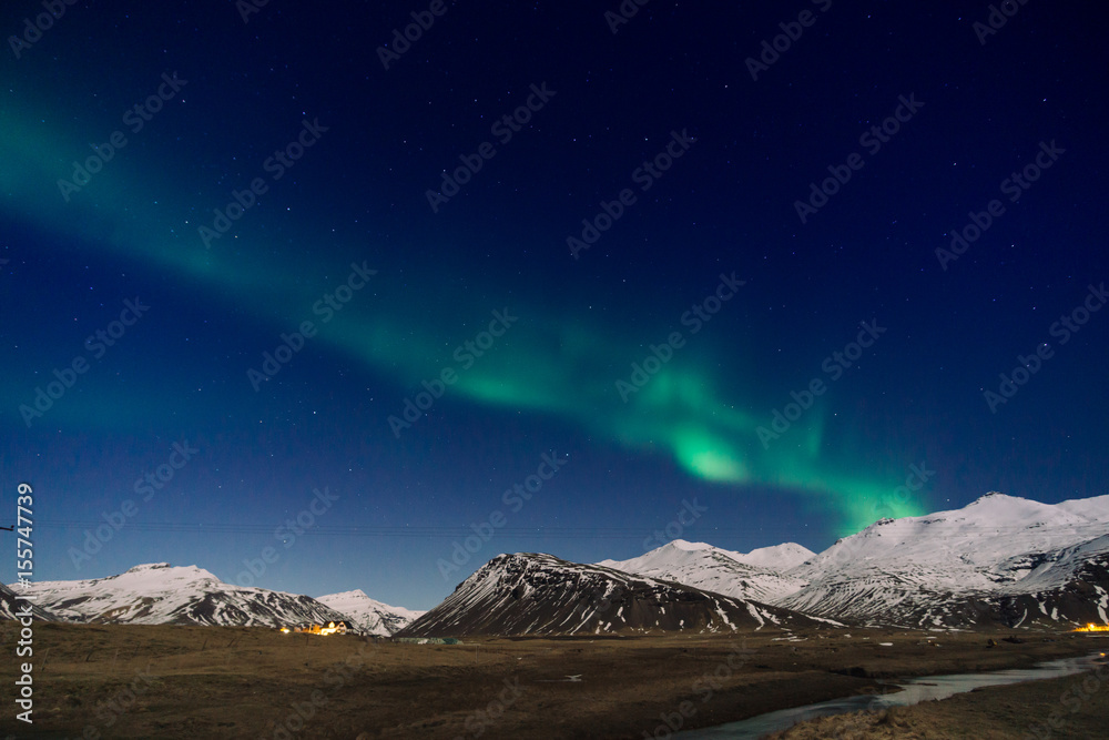 Northen lights over the mountain in Iceland