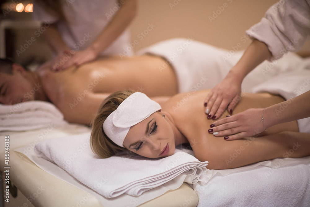 couple receiving a back massage