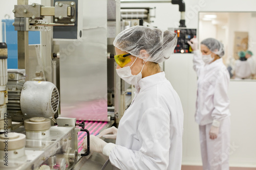  Women working at the pharmaceutical factory. Shallow DOFF. See more images and video from this series. 