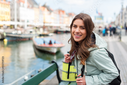 Young woman in the city with backpack