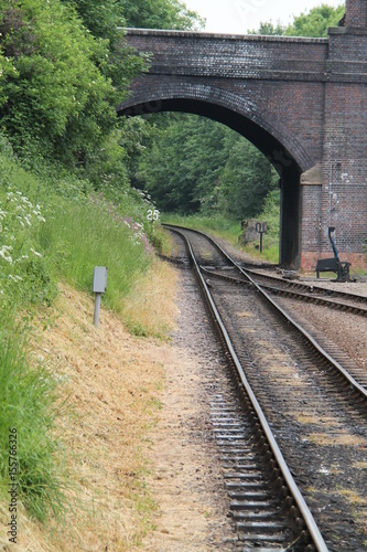 A Brick Bridge Over a Single Track Railway Line.