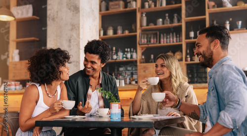 Valokuva Young people sitting at a coffee shop