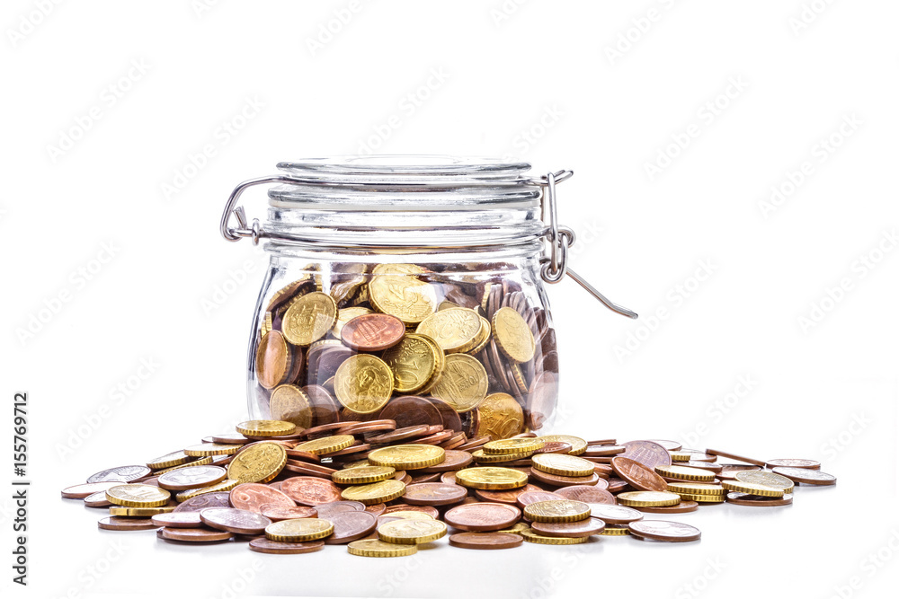 classic glass jar used for canned food filled with euro coins. Concept of family economy and savings. classic glass jar used for canned food filled with euro coins. Concept of family economy and savings.