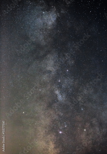 View of the Milky Way Galaxy in the night sky with bright stars. Astrophotography of outer space. © olgapkurguzova