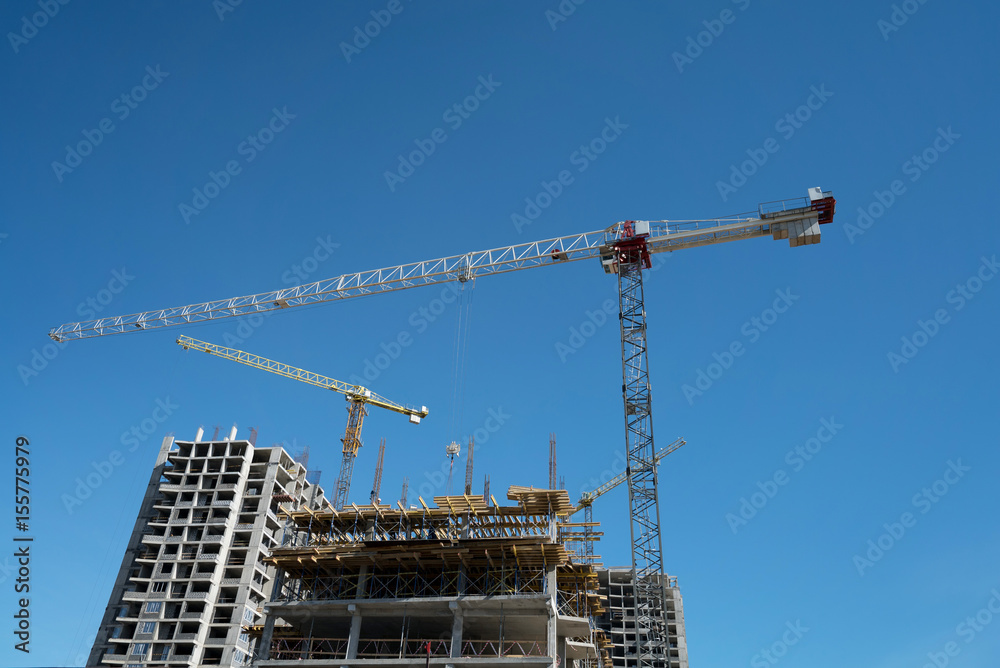 Building of residential buildings, construction crane.