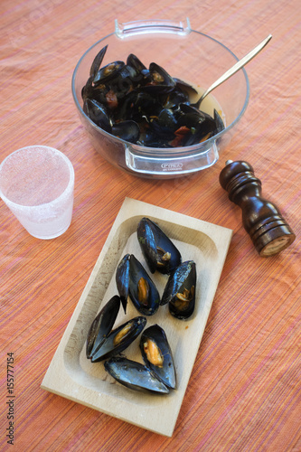 peppered mussels on a set table photo