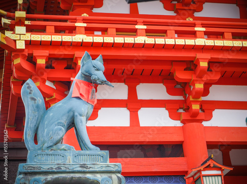 Fox stone statue at Fushimi Inari Shrine. Kyoto, Japan
