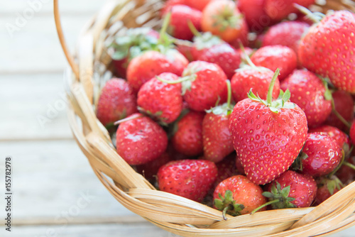 Fresh strawberries in a bamboo basket