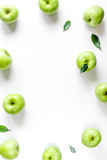 natural food design with green apples frame white desk background top view mock up