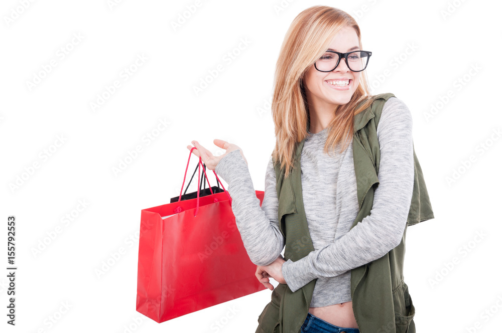 Portrait of young smiling woman with shopping bags Portrait of young smiling woman with shopping bags