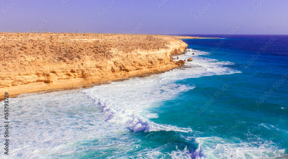 Seashore Waves and Mountain under the Sunshine in Matrouh, Egypt / View of Beautiful Seashore Waves and Majestic Mountain under the Sunshine in Matrouh, Egypt