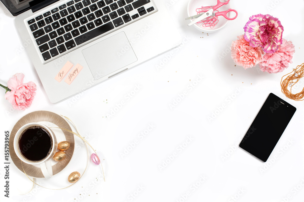 White, gold and pink womens office desk table with a lot of things on it. Top view with copy space.