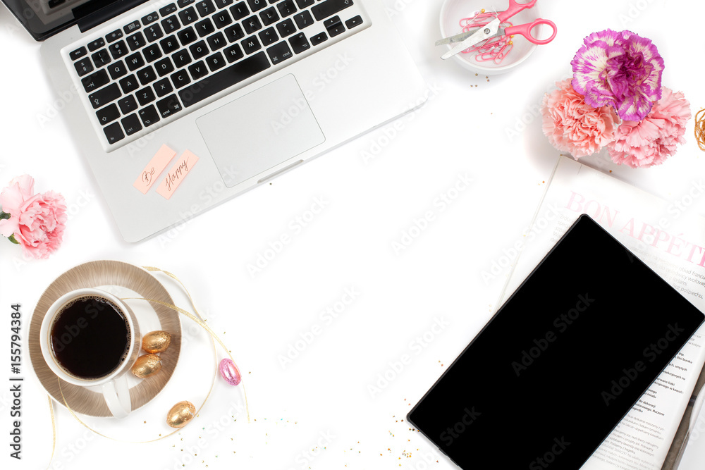 White, gold and pink womens office desk table with a lot of things on it. Top view with copy space.