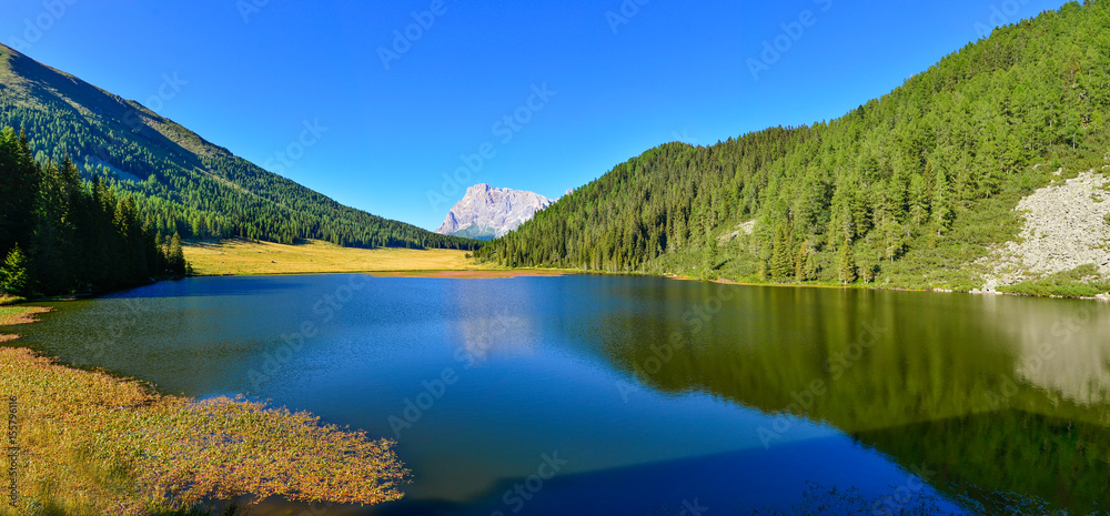 Il lago di Calalta con riflesso delle Pale di San Martino