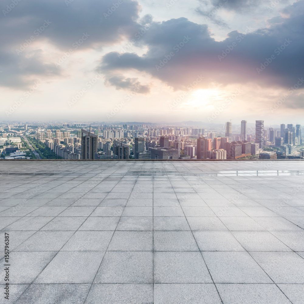 Empty floor with modern city skyline