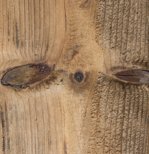 Funny face on wooden board
