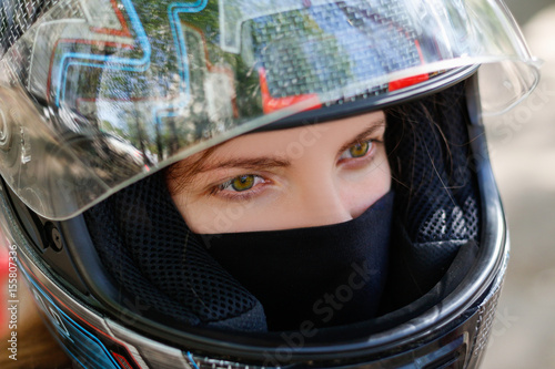 Young girl in a motorcycle helmet © OB production