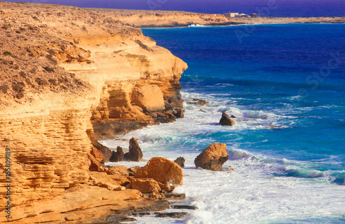 Seashore Waves and Mountain under the Sunshine in Matrouh, Egypt / View of Beautiful Seashore Waves and Majestic Mountain under the Sunshine in Matrouh, Egypt