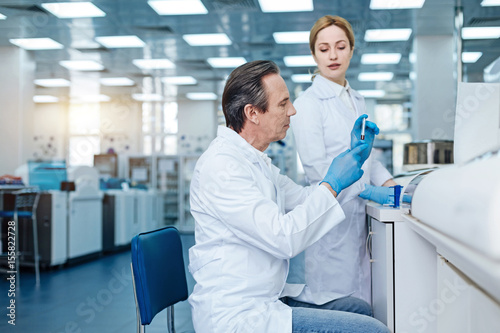 Very attentive technician working in the laboratory