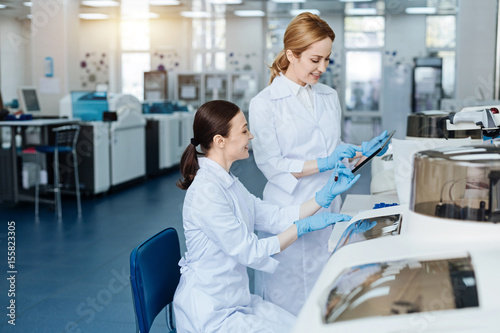 Positive delighted women working in the laboratory