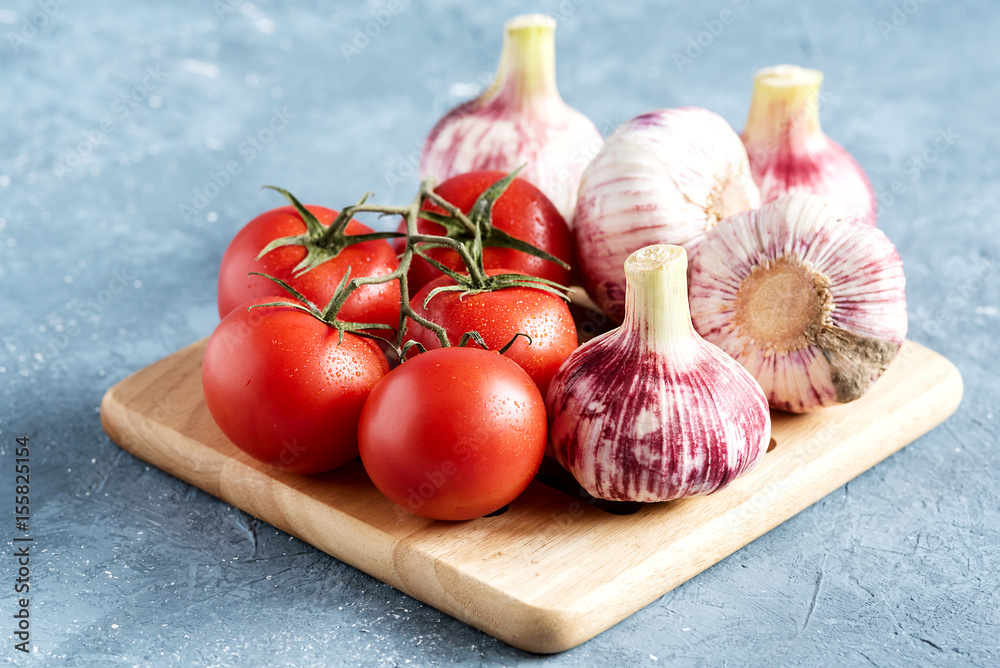 Fresh vegetables on wooden board Horizontal photo Blue background Fresh vegetables on wooden board Horizontal photo Blue background