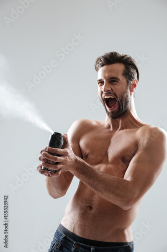 Man spattering deodorant and scream