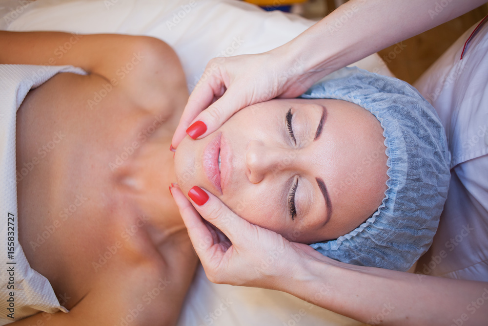 doctor cosmetologist doing facial massage girl spa doctor cosmetologist doing facial massage girl spa