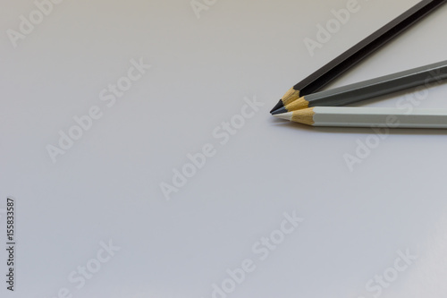 Colour pencils over white background. Shallow depth of field.