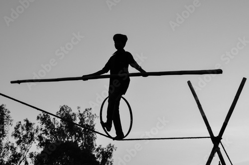 Young Boy Tightrope walking, Slacklining, Funambulism, Rope Balancing