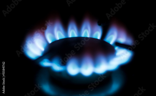 circle gas flame at home kitchen isolated on black