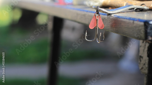 fishing hook and red lure