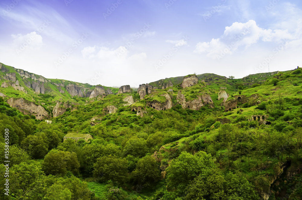 Beautiful mountain landscape, with mountain peaks covered with forest and a cloudy sky. Armenian and Georgian mountains, Caucasian mountain range