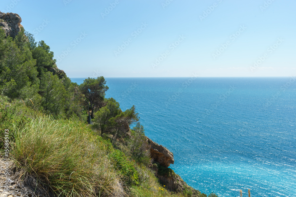 The Mediterranean sea and forrest near Benitatxell, Alicante, Spain