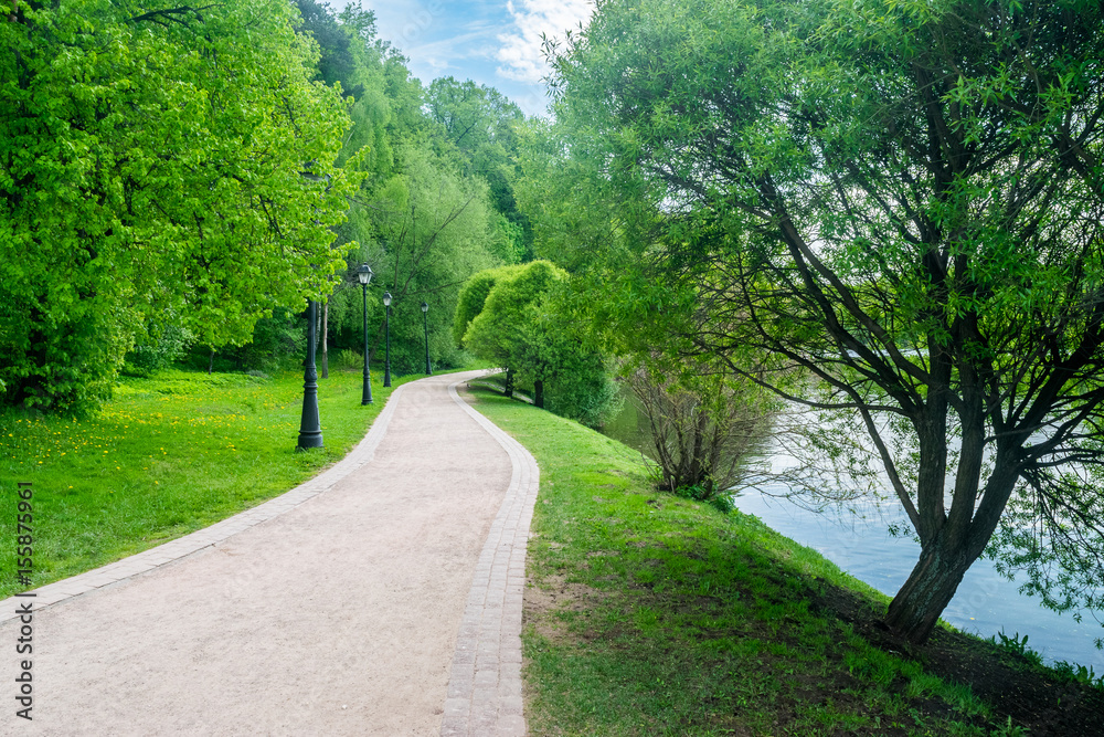 The pathway along the Upper pond in Tsaritsyno park and reserve in Moscow, Russia