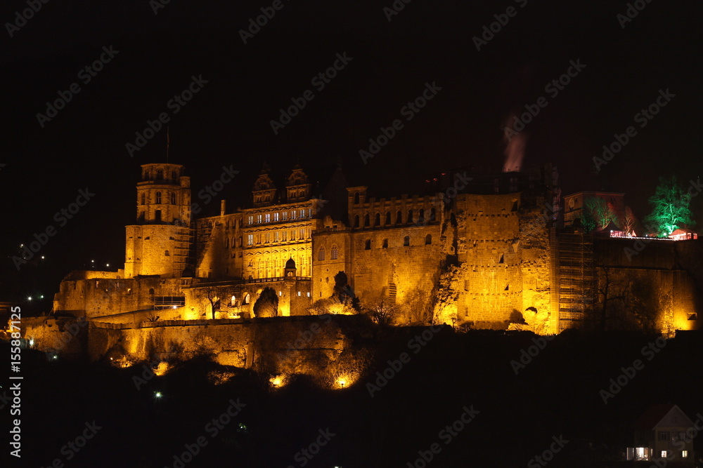 The castle in Heidelberg illuminated during night