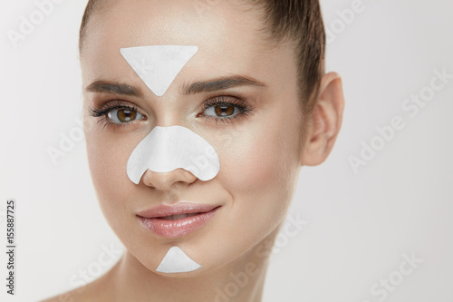 Woman Beauty Face With Mask. Close Up Of Female With Patches © puhhha