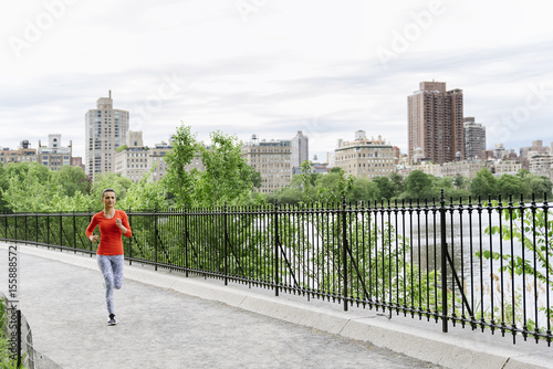 Photography Young beautiful woman running.