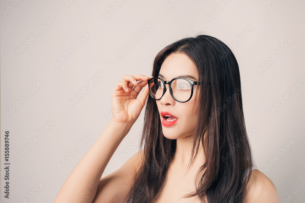 Young beautiful Asian woman with smiley face wearing glasses. Young beautiful Asian woman with smiley face wearing glasses.