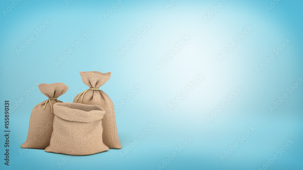 3d rendering of a three money bags on blue background, two of them tied up and one open.