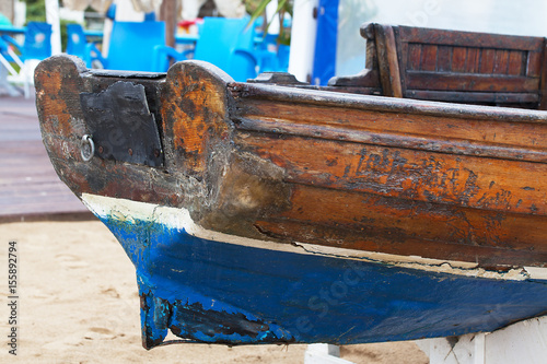 Old rotten wooden boat.